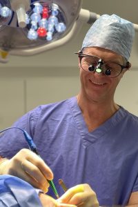 cosmetic surgeon oliver harley in operating theatre at mcindoe centre east grinstead sussex